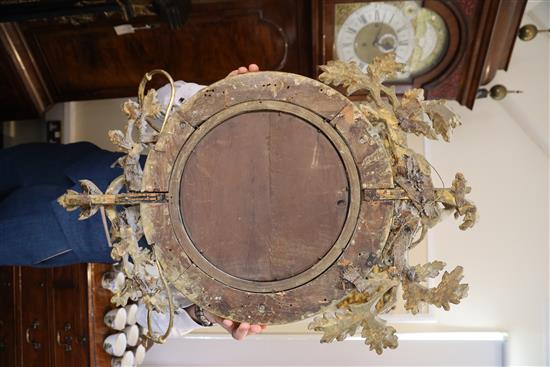 A Regency giltwood and gesso convex wall mirror, W.1ft 11in. H.2ft 7in.